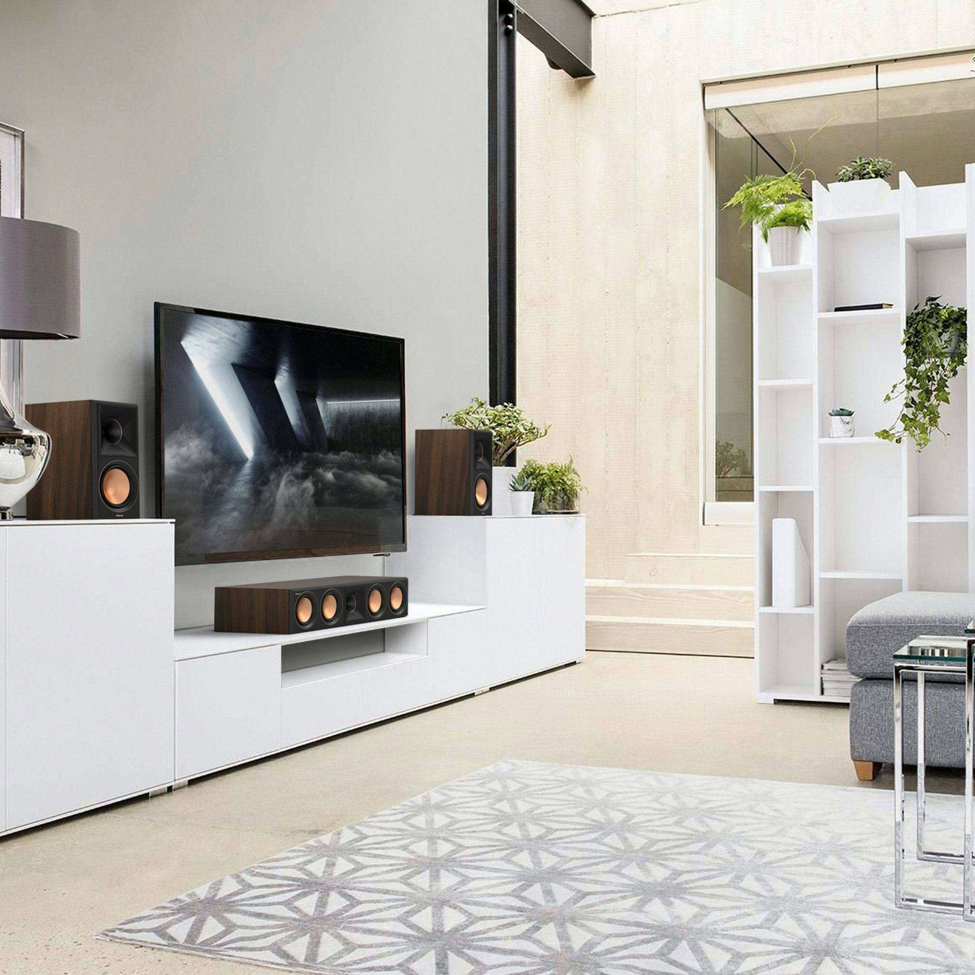 RP 600 M II Carousel 18- brown wood speakers with gold accent in white living room with plants